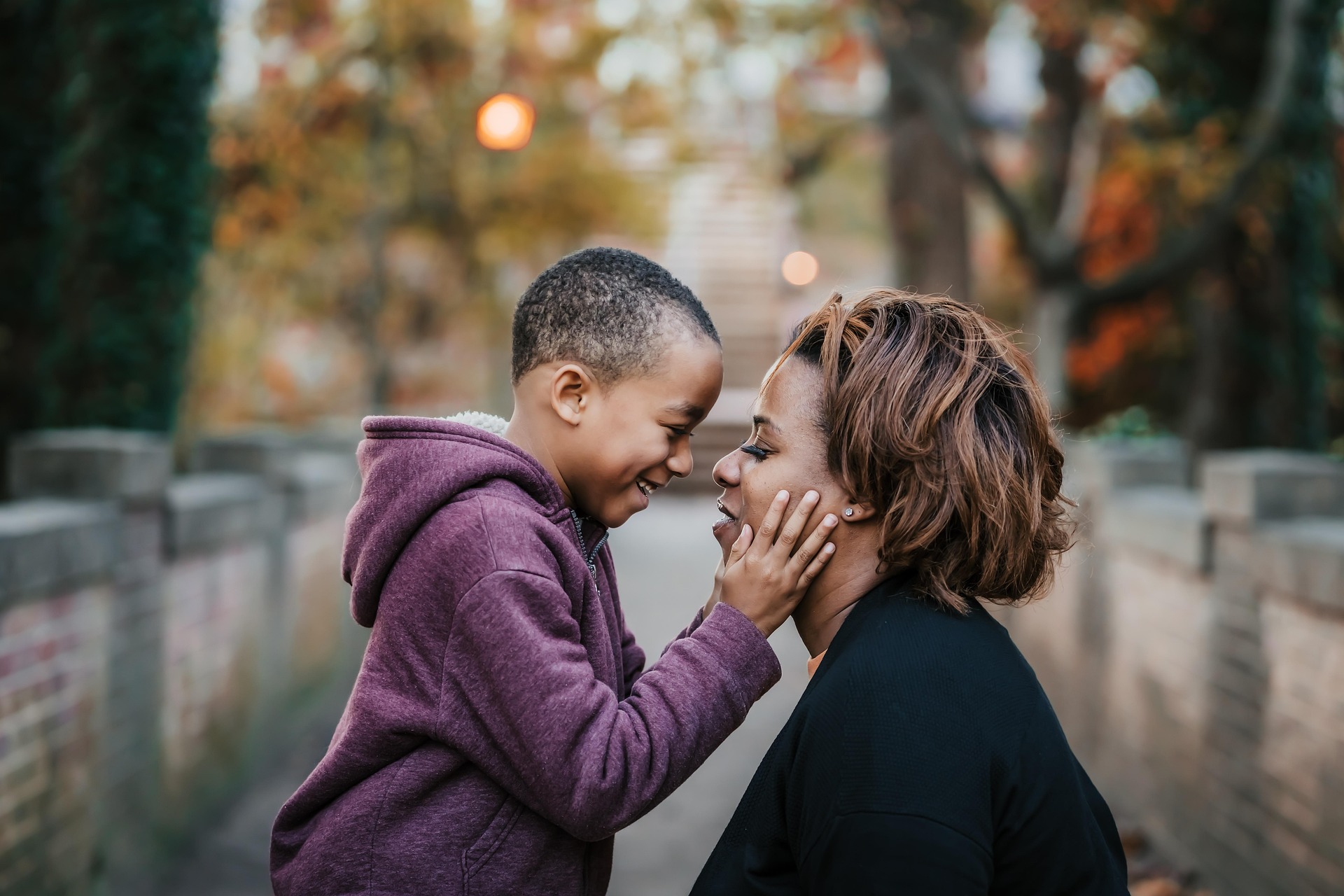 Home | Media Centre 11 Child kissing Mom
